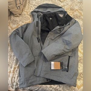 Men's XL Clement tri jacket. There is an internal down zip out jacket.